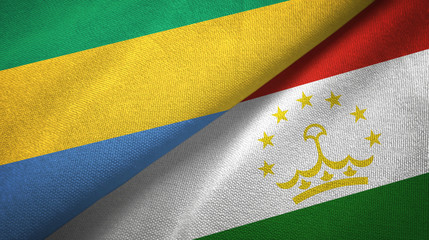 Gabon and Tajikistan two flags textile cloth, fabric texture