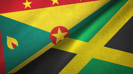 Fototapeta premium Grenada and Jamaica two flags textile cloth, fabric texture