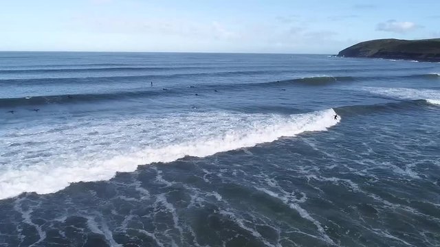 Surfers at Croyde Beach in England
