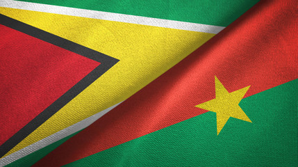 Fototapeta premium Guyana and Burkina Faso two flags textile cloth, fabric texture 