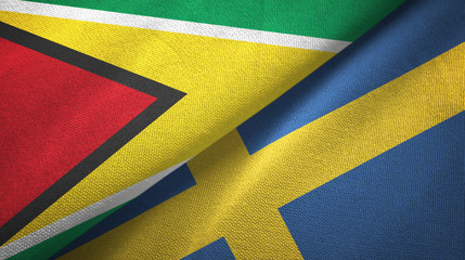 Guyana and Sweden two flags textile cloth, fabric texture