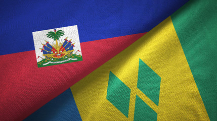 Fototapeta premium Haiti and Saint Vincent and the Grenadines two flags textile cloth