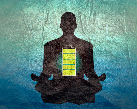 Businessman in with battery icon. Full battery concept. Business and life energy. High full level energy battery. Man sit in meditation pose.