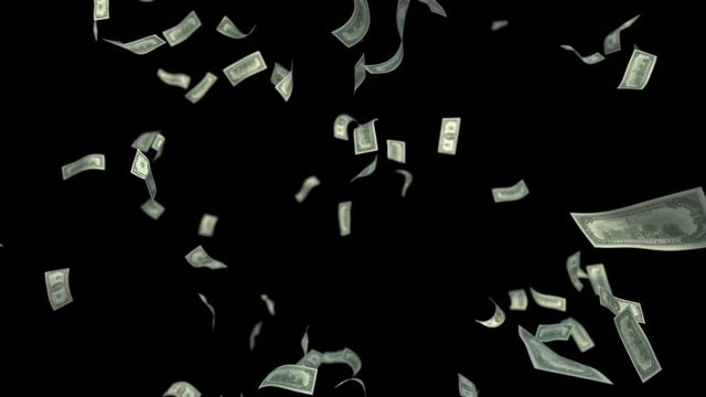 High quality shot of falling dollar bills with depth of field.