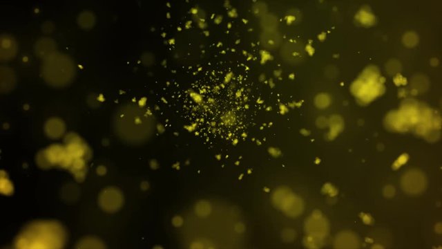 motion of defocused yellow cloudlets fall slowly with black background