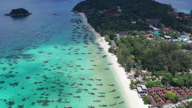 Aerial drone view of beautiful tropical Sunrise Beach during sunny summer day, Koh Lipe, Thailand