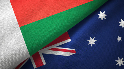 Madagascar and Australia two flags textile cloth, fabric texture 