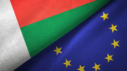 Madagascar and European Union two flags textile cloth, fabric texture