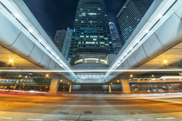Fototapeta na wymiar traffic in downtown district of Hong Kong city at night