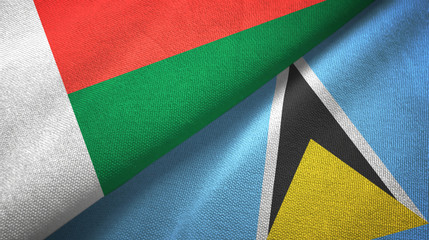 Madagascar and Saint Lucia two flags textile cloth, fabric texture