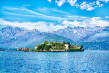 Isola Bella Island on the beautiful Lake Lago Maggiore in the background of the Alps mountains, Stresa, Italy