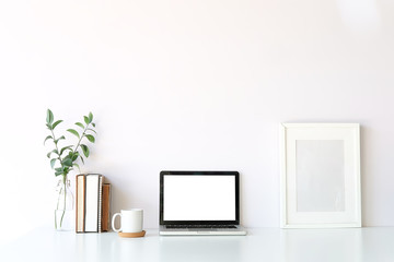 Workspace desk and laptop. copy space and blank screen. Business image, Blank screen laptop and supplies.
