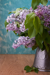 bouquet of lilac in a vase on the table flowers