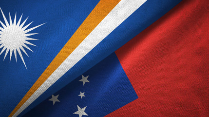 Fototapeta premium Marshall Islands and Samoa two flags textile cloth, fabric texture