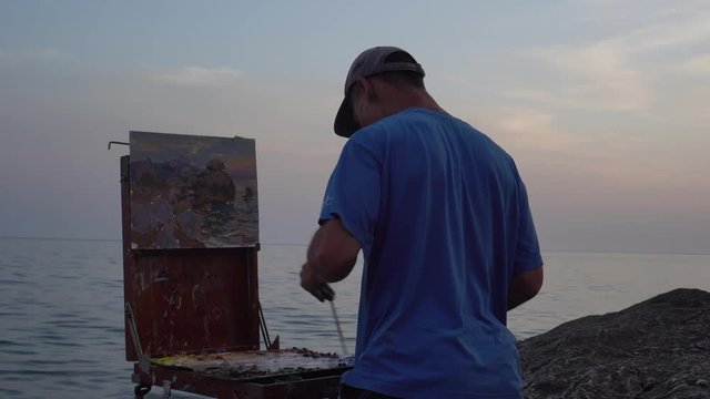 A creative work, artwork. Plein Air Painting Artist. Oil on canvas. Sea landscape. Summer sunset