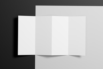 Empty folded paper. White sheet on a black background. Mock up. Top view. 3d rendering