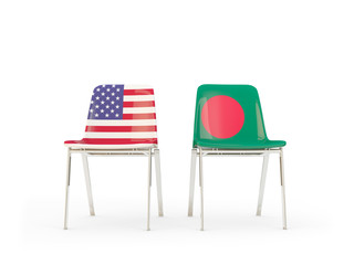 Two chairs with flags of United States and bangladesh isolated on white