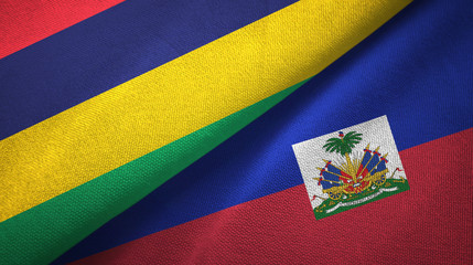 Fototapeta premium Mauritius and Haiti two flags textile cloth, fabric texture