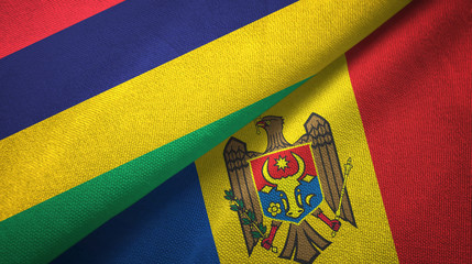 Fototapeta premium Mauritius and Moldova two flags textile cloth, fabric texture