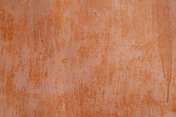 Red brown painted grunge metal garage wall background. Copy space