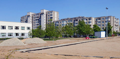 Construction site of a  car parking in a standard residential area of European town