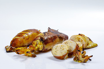 Charcoal grilled stuffed Squid Calamari cattle fish on white background