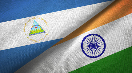 Nicaragua and India two flags textile cloth, fabric texture