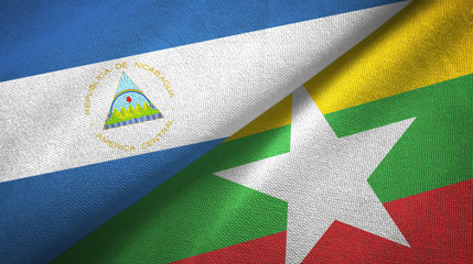 Nicaragua and Myanmar two flags textile cloth, fabric texture