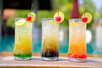 summer drinks and cocktails at swimming pool