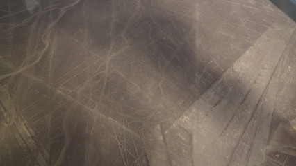 Aerial airplane panoramic view to Nazca geoglyph lines aka frigate bird and heron or flamingo ,...