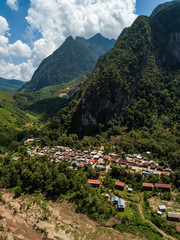 Fototapeta na wymiar Nong Khiaw panoramic view over Nam Ou River valley Laos national flag scenic mountain landscape famous travel destination in South East Asia