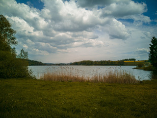 landscape with lake and blue sky
