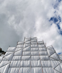 Coverd building with sky and clouds