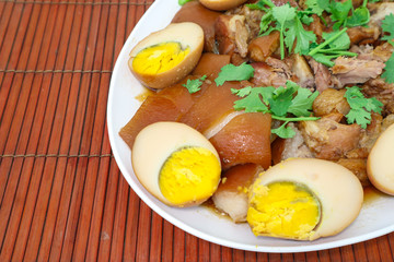 fried eggs with bacon and bacon on plate