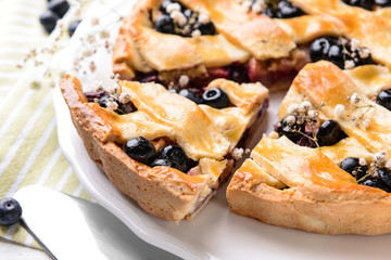 Tasty blueberry pie on table, closeup