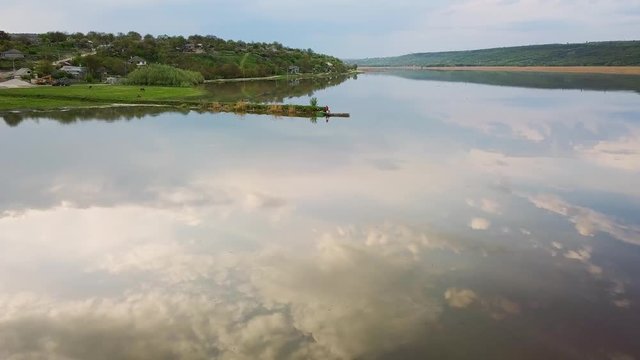 Flight over the river aat spring time. Dniester river of Moldova republic.
