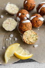 Tasty falafel balls on parchment, closeup