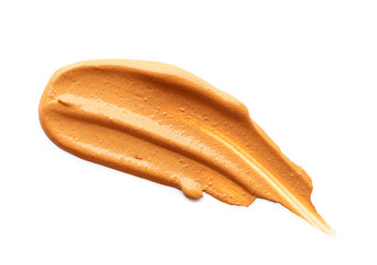 Stroke of cosmetic clay on white background