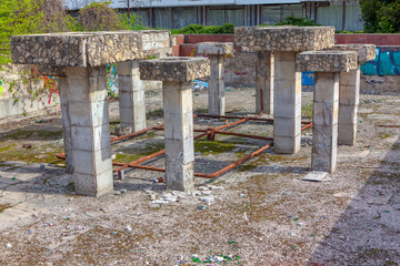 ruined and abandoned fountain without water 