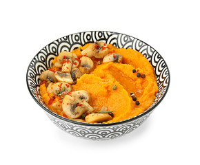 Bowl with mashed sweet potato and mushrooms on white background