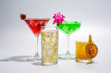 Various cocktails on a light and dark background