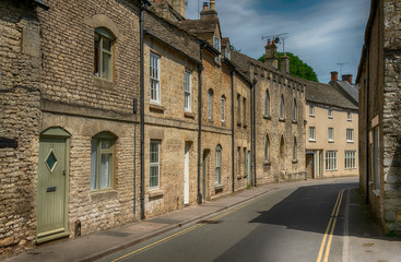 Narrow streets of the Cotswold village of Minchinhampton, Gloucestershire, UK