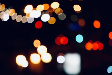 colorful lights in the street in the city at night, bokeh lights