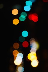 colorful lights in the street in the city at night, bokeh lights