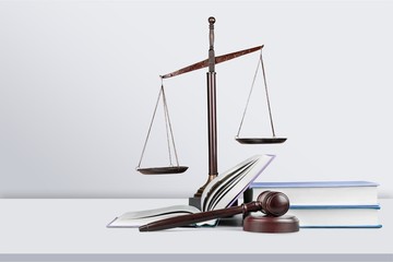 Justice Scales and books and wooden gavel on table. Justice concept