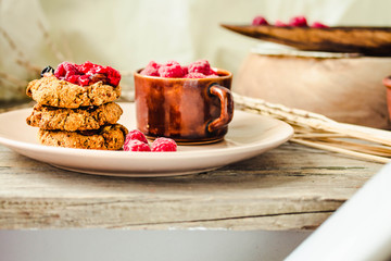 Oat and peanut butter cookies with date and berry. Diet detox food dessert concept.