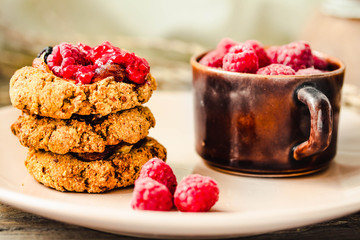 Oat and peanut butter cookies with date and berry. Diet detox food dessert concept.