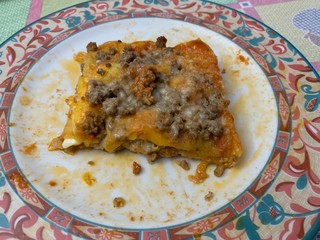 Homemade Bolognese lasagna, typical dish of Italian cuisine.