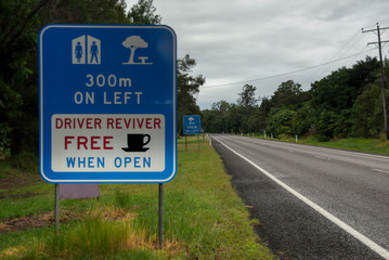 Information traffic signal from of the service area on the road with free coffee for drivers.