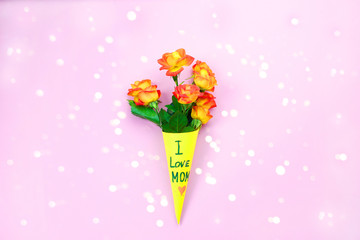 I Love my Mom concept. Flowers composition on pink background. Happy Mother's Day. Festive concept. LOVE MOM message